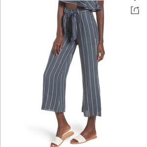 Faithfull the brand Como Pinstripe Wide Leg Crop Linen Pants In Charcoal US 4